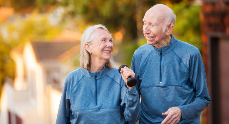 older couple exercising outside